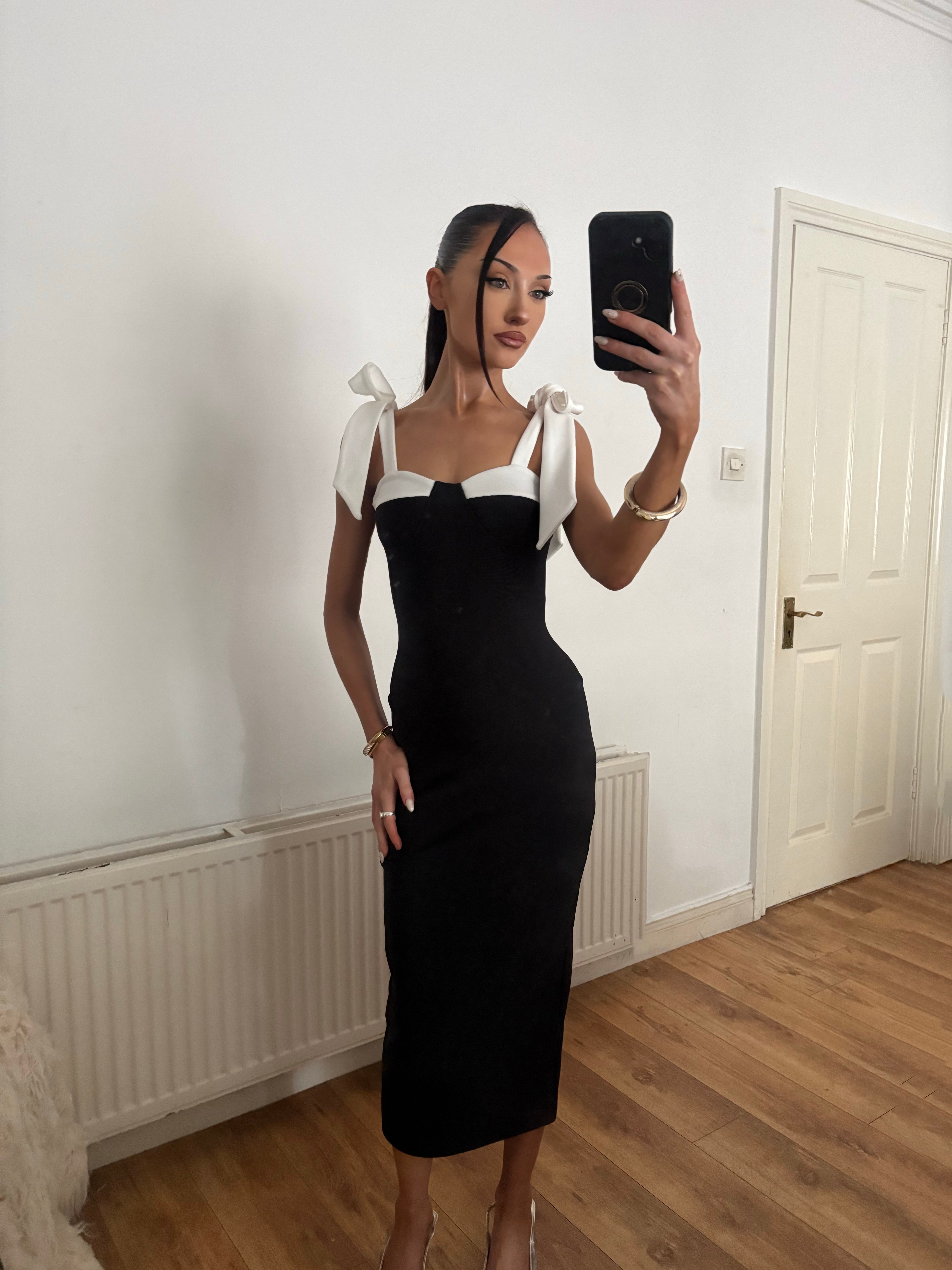 BLACK BANDAGE WITH WHITE BOW SHOULDERS